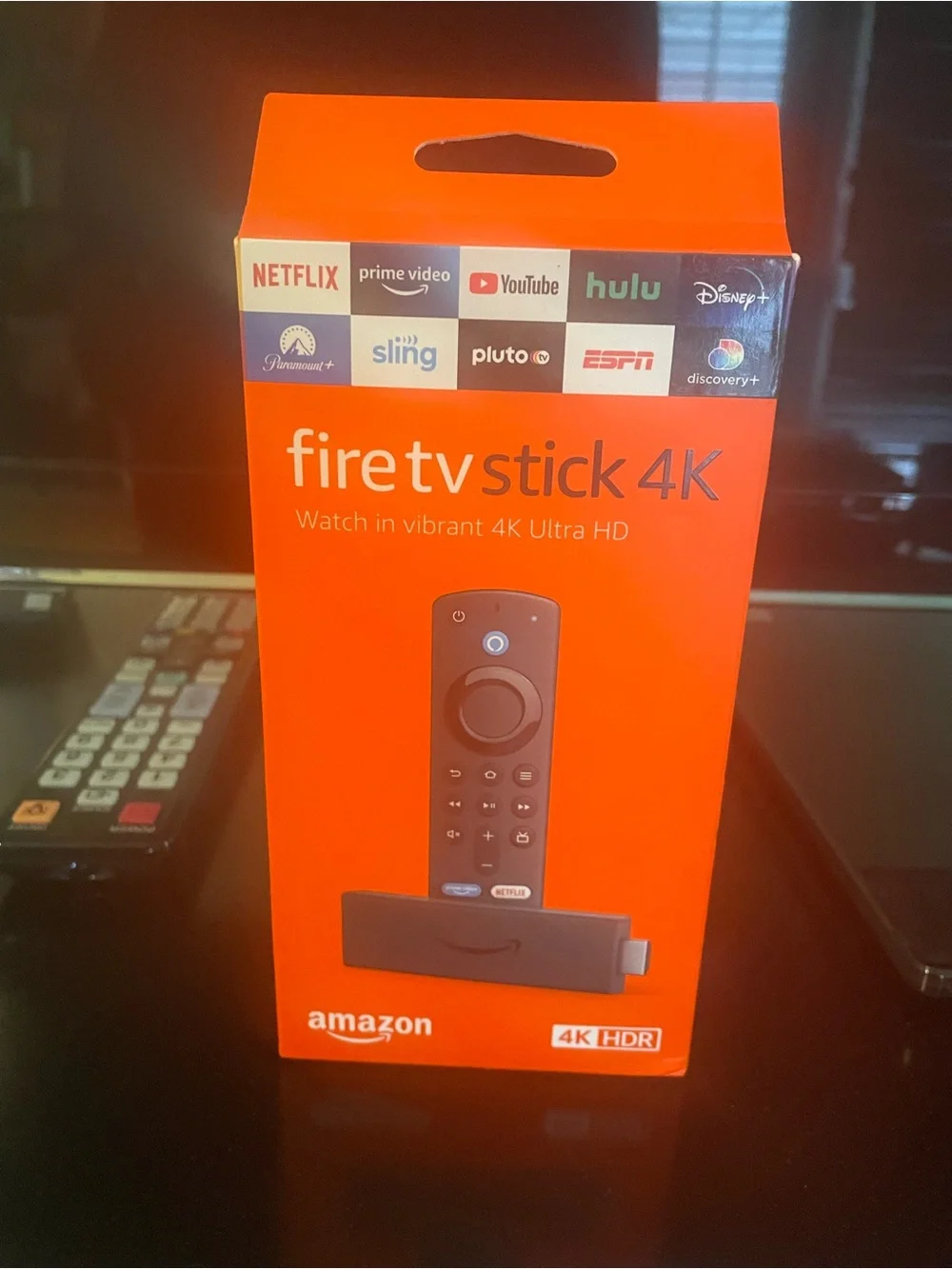 Amazon Fire TV Stick 4K – Orange Packaging with Black Remote